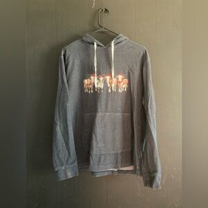 Charming Navy Hoodie with Festive Cow Design